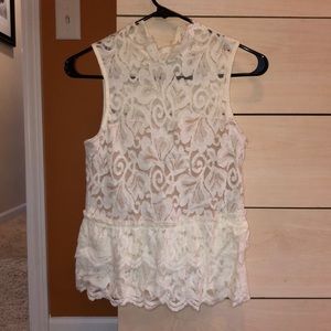 White shirt with tan under coat